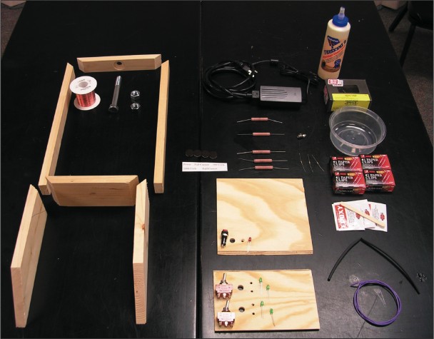 All of the components have been gathered. The wood for the base sections has been cut and holes for the hardware have been drilled.