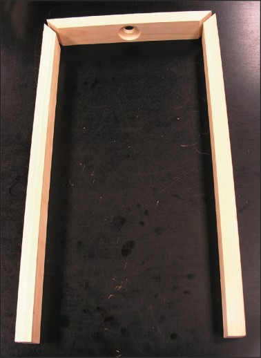 Seen prior to joining, the top and side rails form the magnet support frame.